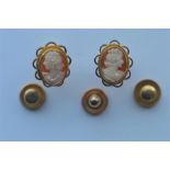 A pair of 9 carat cameo earrings together with three gold dress studs. Approx. 6.7 grams. Est. £30 -