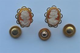 A pair of 9 carat cameo earrings together with three gold dress studs. Approx. 6.7 grams. Est. £30 -