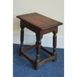 A period style Oak joint stool having turned legs