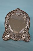 A large heart shaped dressing table mirror heavily