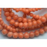 A string of graduated coral beads weighing approx. 31 grams. Est. £90 - £120.