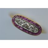 A good quality ruby and diamond Edwardian boat shaped cluster ring in 18 carat mount. Est. £600 - £