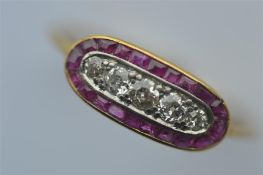 A good quality ruby and diamond Edwardian boat shaped cluster ring in 18 carat mount. Est. £600 - £