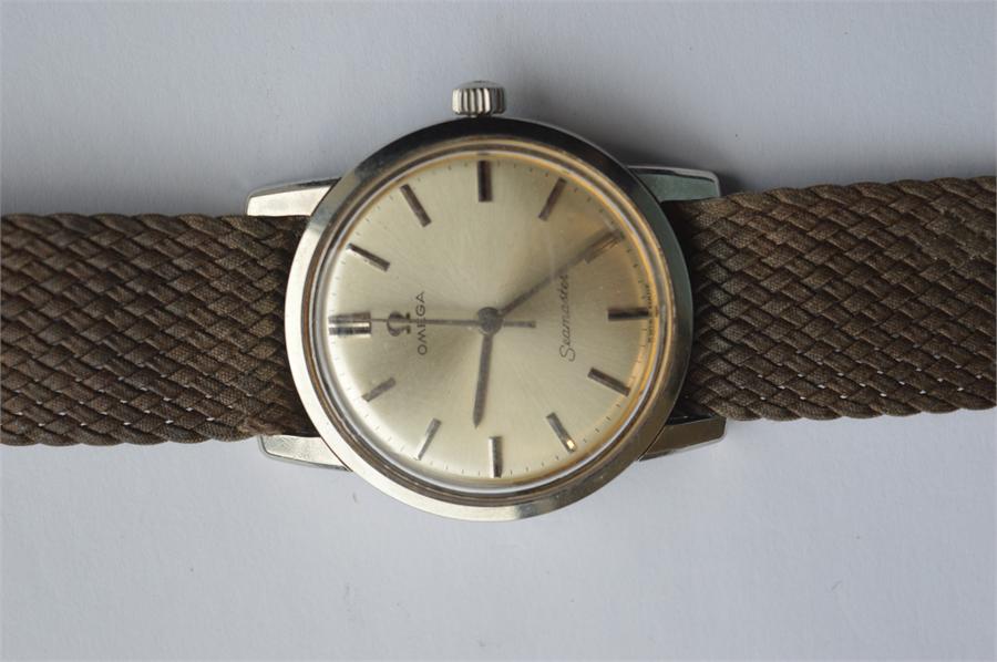 A gent's stainless steel Omega Seamaster on velvet strap. Est. £100 - £120. - Image 2 of 2