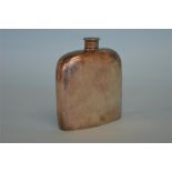 A good oval hip flask with twist lid and crested side. Birmingham 1902. Est £40 - £60.
