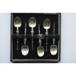 An unusual set of six apostle top coffee spoons wi