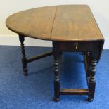 A good Antique Oak gate leg table on turned suppor