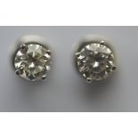 A good pair of diamond ear studs in white gold claw mount, each diamond weighing approx. 0.75