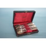 A set of six Continental teaspoons in fitted box.