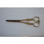 A pair of unusual Continental scissors mounted wit
