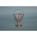 George III swing handled pierced bonbon basket on