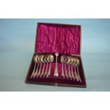 A good quality cased set of teaspoons and tongs.wi