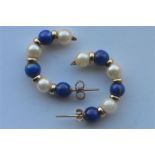 A pair of lapis and pearl gold hoop earrings. Est. £20 - £30.