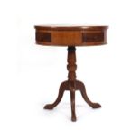An oak drum table, the circular top inlaid for chess, on tripod legs, d. 57 cm Structurally sound,