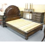 A Victorian mahogany double bedstead with moulded and arched headboard, headboard w. 149 cm