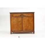 A 19th century French figured walnut commode with hinged top and a pair of doors on turned feet,