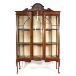 An Edwardian mahogany, strung and inlaid bow fronted display cabinet on cabriole legs, w. 103 cm