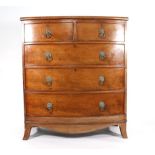 A Regency mahogany bow fronted chest of three long and two short drawers on swept bracket feet, w.