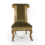 A Victorian and later gilded prie dieu Wear commensurate with age, frame regilded, structurally