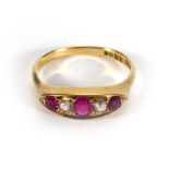 An 18ct yellow gold ring set three graduated rubies interspersed with two diamonds,  Cornelius