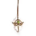 A yellow metal fine curblink necklace suspending an Edwardian 15ct yellow gold openwork pendant