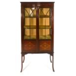 An Edwardian mahogany, inlaid and glazed two door display cabinet on square legs with splayed