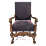 An 18th century-style oak and upholstered hall armchair on scrolled legs with claw feet CONDITION