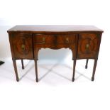 An 18th century-style bow fronted mahogany sideboard, the single drawer flanked by two doors on