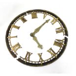 A 19th century cast iron clock dial with Roman numerals and detached hands, d. 140 cm CONDITION
