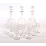 A set of three 19th century etched glass liqueur decanters and stoppers, h. 21 cm and nine