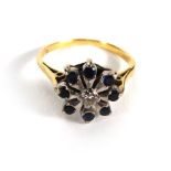 An 18ct yellow gold ring set centrally w