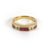 An 18ct yellow gold ring set four rubies