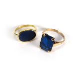 A yellow metal ring set oval lapis lazul