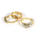 An 18ct yellow gold ring set five small