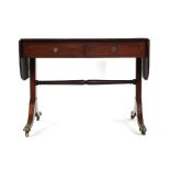 A Regency mahogany and inlaid sofa table on rectangular supports with sabre legs, max l. 150 cm