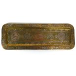 A Middle Eastern brass, copper and silvered tray of rectangular form with geometric, organic and