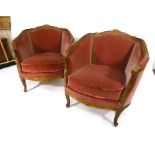 A pair of walnut and upholstered armchairs on cabriole legs CONDITION REPORT: Good