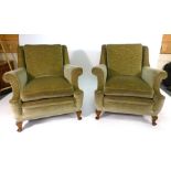 A pair of green draylon upholstered open armchairs on beech pad feet CONDITION REPORT: Good,