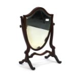 A Victorian mahogany swing mirror of shield-form, h. 58 cm CONDITION REPORT: Wear commensurate