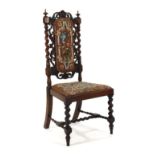 A 19th century mahogany and tapestry upholstered hall chair with barley-twist supports and back