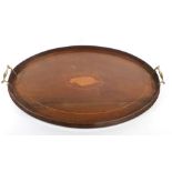An Edwardian mahogany and inlaid butlers' tray of oval form, l. 60 cm CONDITION REPORT: Wear
