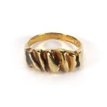 A 14ct yellow bark design gold ring, 5.1