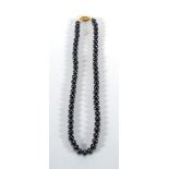 A single strand cultured black pearl nec