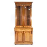 A 19th century walnut and glazed cabinet bookcase on a plinth base, w. 91 cm CONDITION REPORT:
