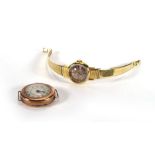 An 18ct yellow gold cased ladies wristwatch by Omega, the silvered dial with baton numerals on an