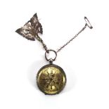 A continental florally engraved silver fob watch suspending a silver brooch in the form of a