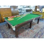 A metamorphic mahogany framed slate bed snooker table, converting to a dining table, 255 x 136 cm,