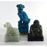 A turquoise glazed figure in the form of a temple dog, h. 11 cm and two hardstone carvings CONDITION
