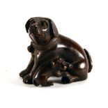 A carved hardwood netsuke modelled as a dog and its young, h. 4 cm, together another humorously