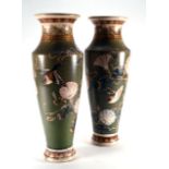 A pair of early 20th century Japanese satsuma vases of slender baluster form decorated with